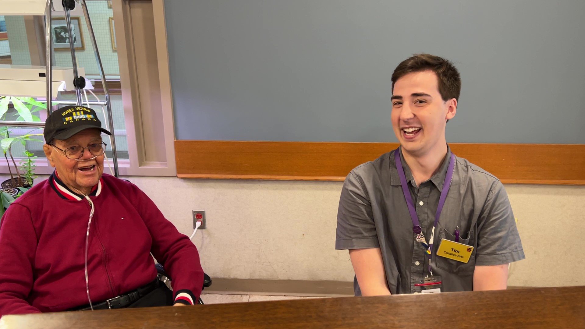 Albert at the piano with Perley Health Music Therapist, Tim Cote. Albert loved singing and was a member of the Perley Health choir. Albert and Tim singing.jpg