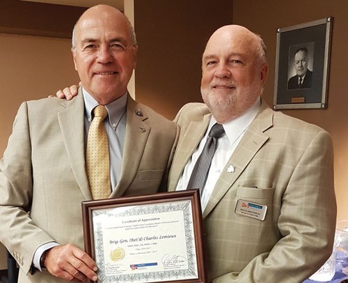 Doug Brousseau (right) presents outgoing Board Chair Charles Lemieux with a certificate of appreciation. doug-brousseau-charles-lemieux.jpg